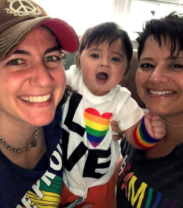 Ann Marie and Darlene with their adoptive son.