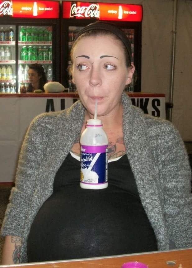 Alison posing with her pregnant bump