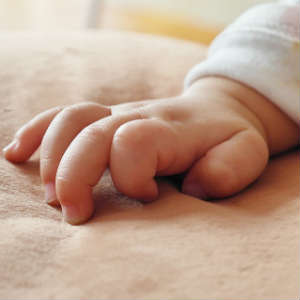 hand of an adopted infant near Beechview