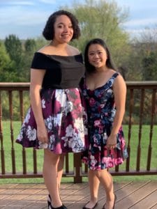 Sara and Megan dressed formally
